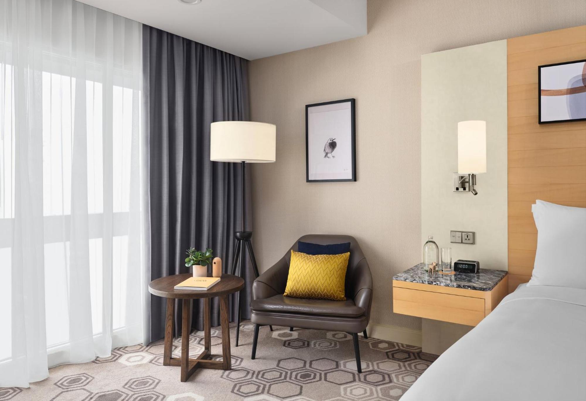 Voco Orchard Singapore By Ihg Exterior foto A room at the hotel